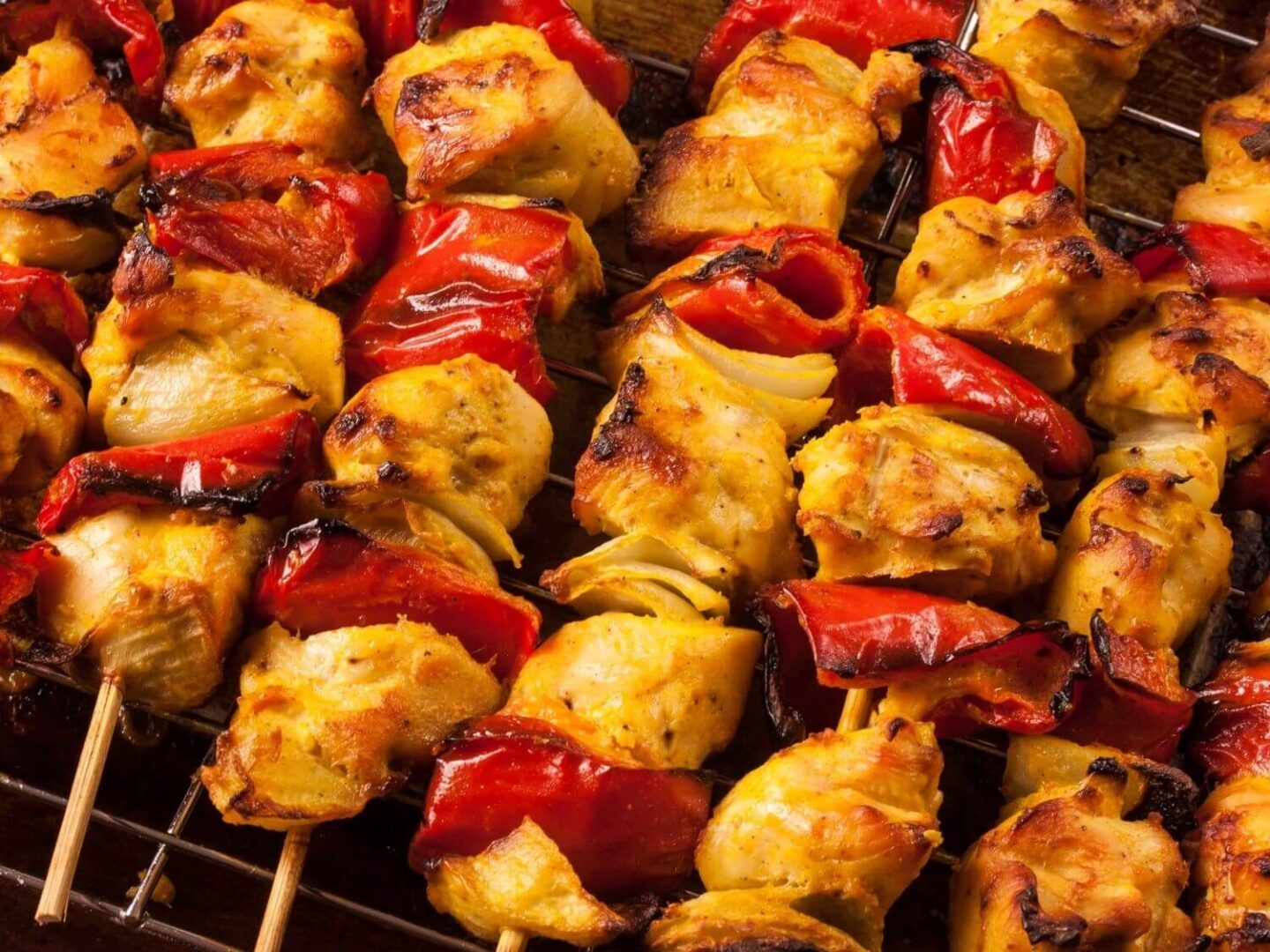 Chicken tikka skewers on the grill