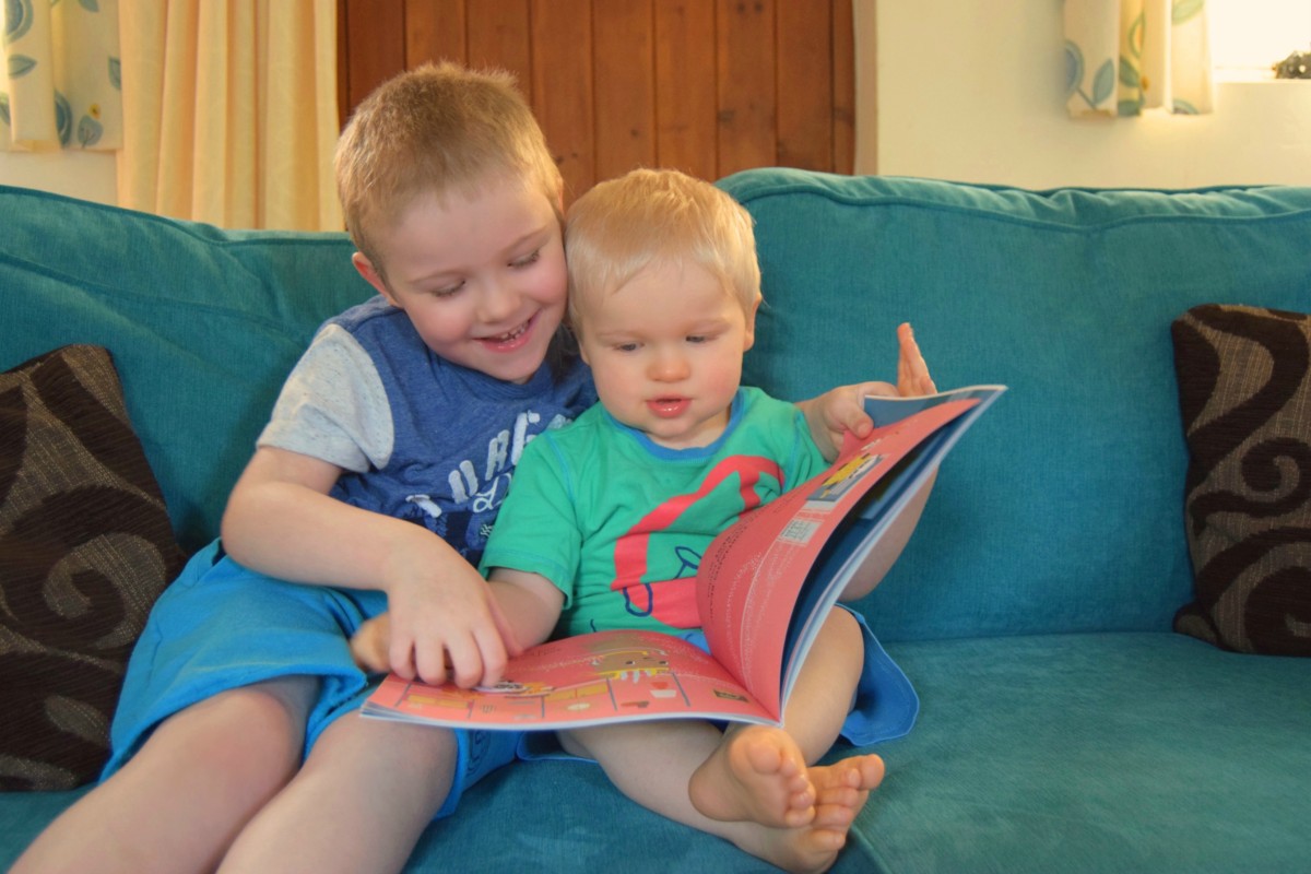 the boys reading Pom Pom is super