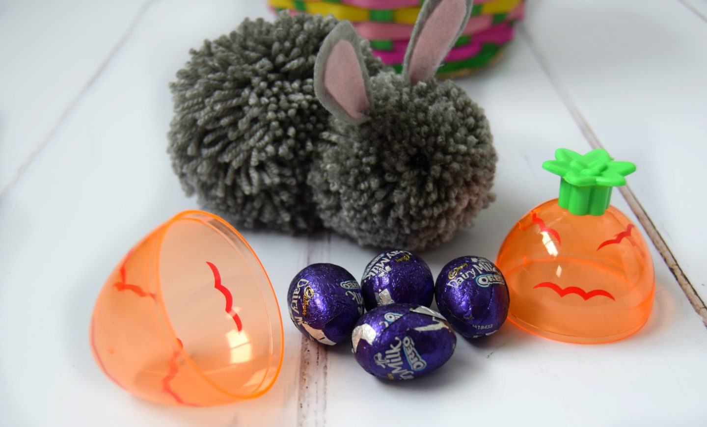 An Easter pom pom bunny with chocolate oreo eggs.