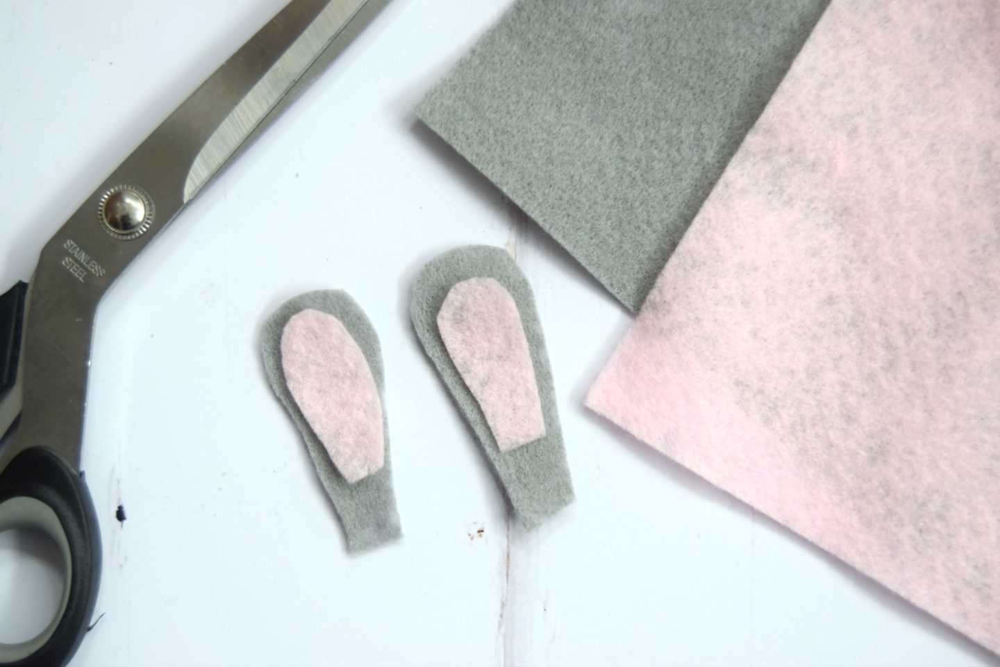 Felt crafts. Cutting ears out for a pom pom bunny.
