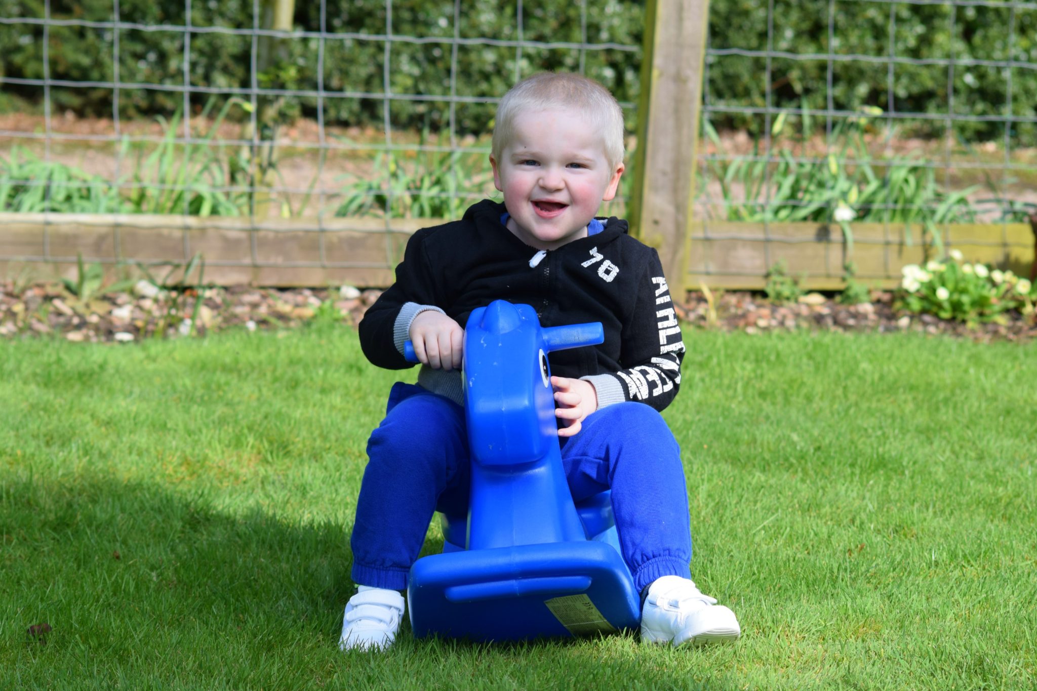 Monday Morning Blog Club. My boy playing on his seesaw.