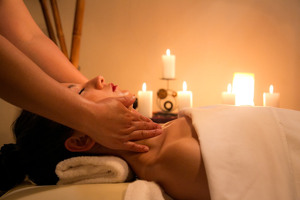 Self-care for mums. A lady enjoying a massage at a Spa.