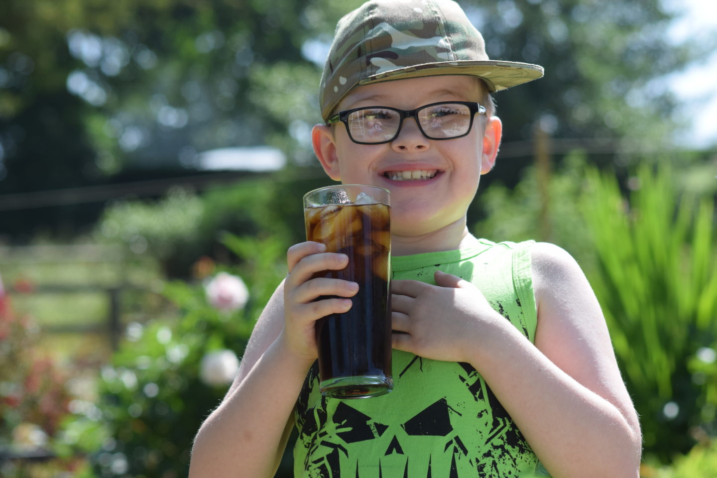 Jayden drinking an iced caffeine free Barleycup