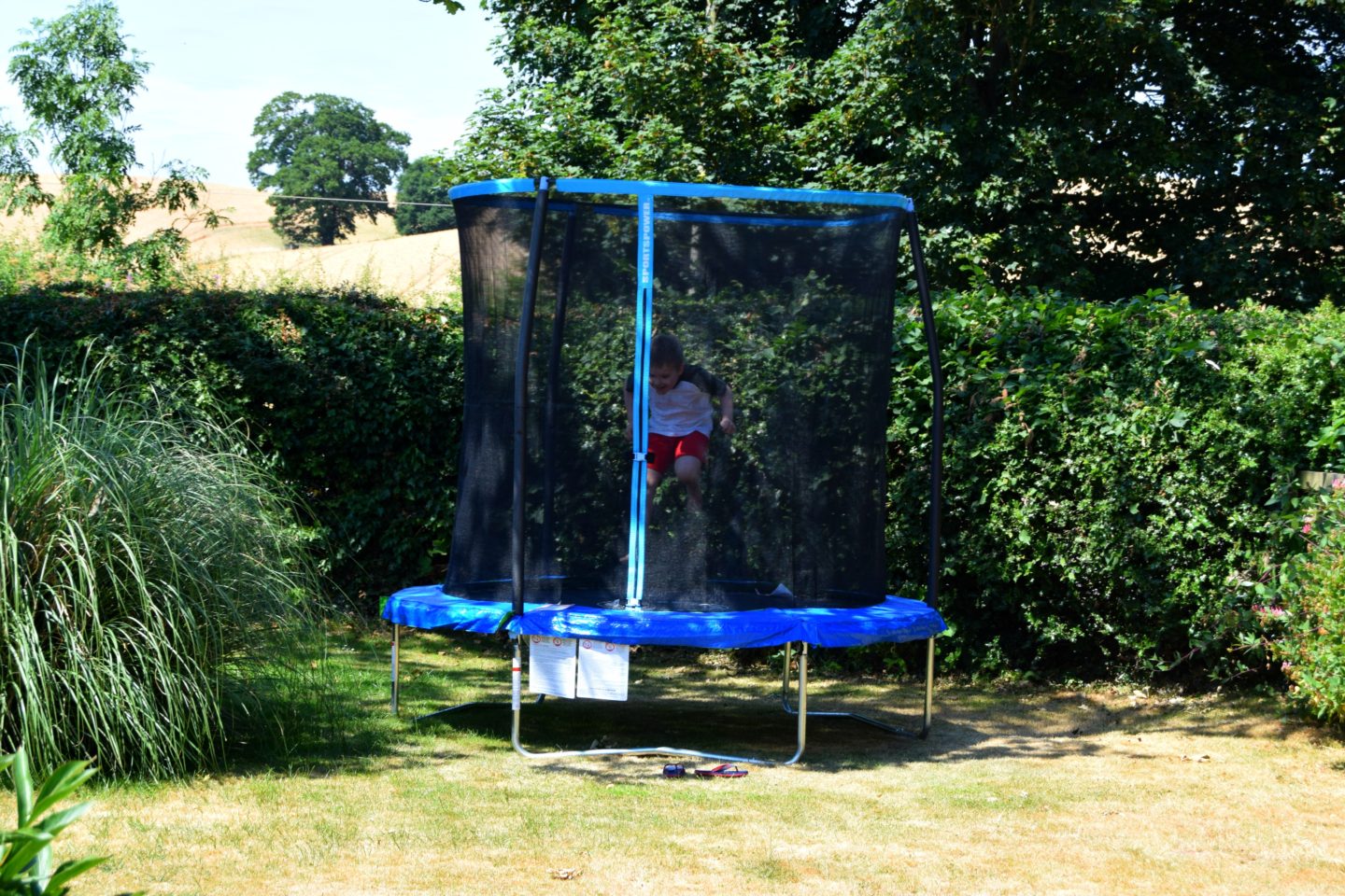 Having fun bouncing on our 8ft trampoline
