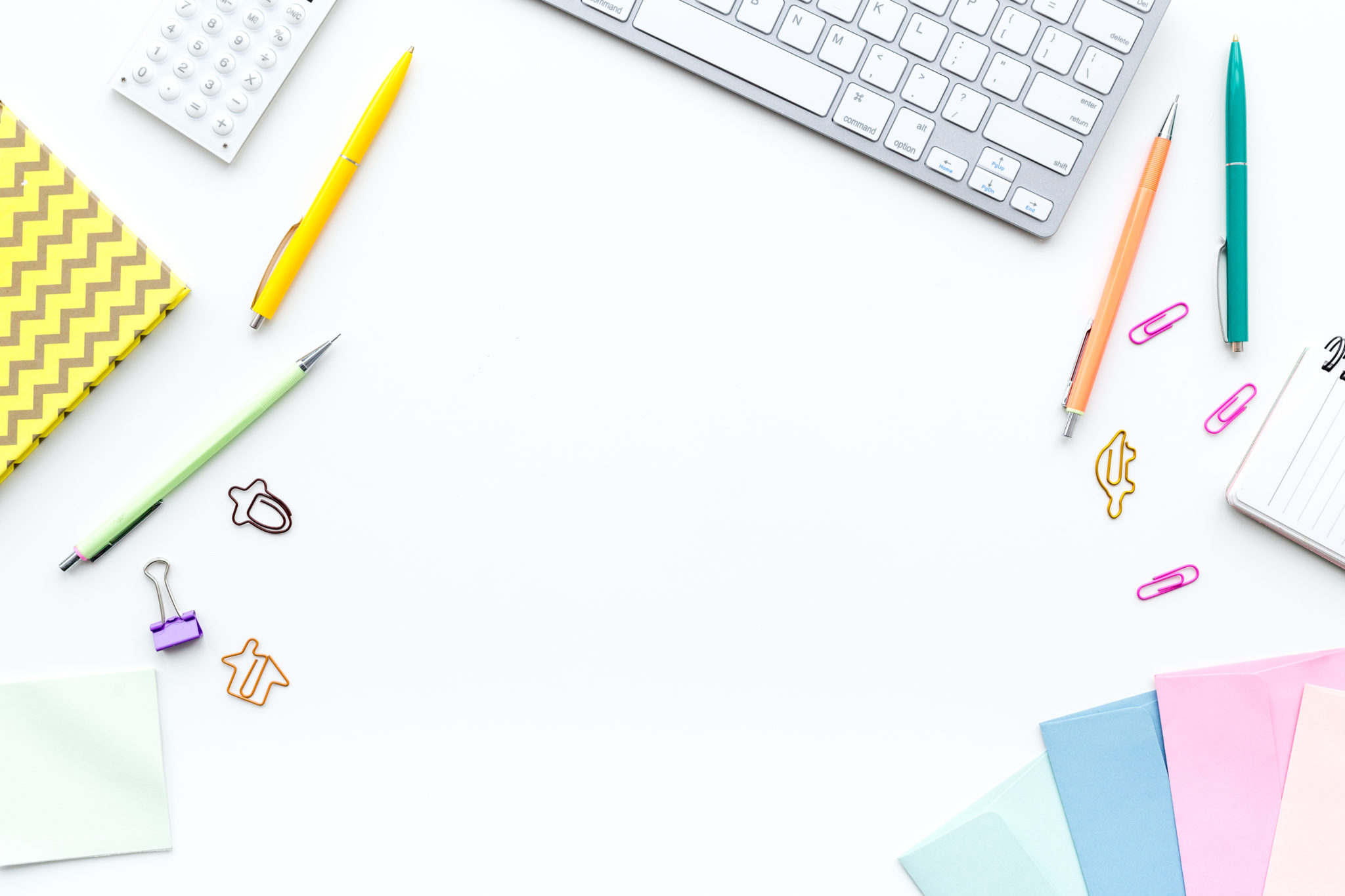 A colourful desktop flat lay.