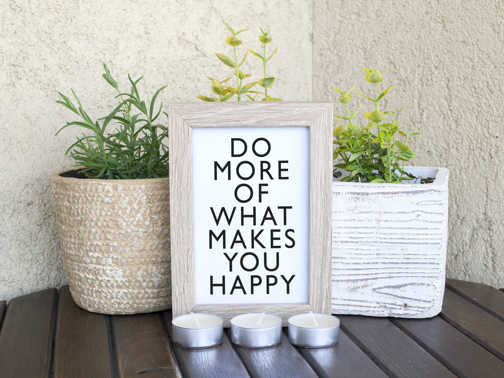 A sign that reads Do more of what makes you happy. Self care ideas.