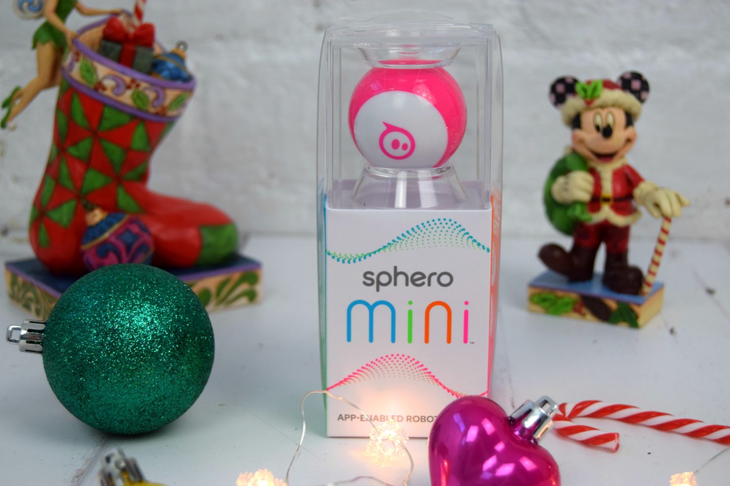 A pink Sphero Mini robot ball.