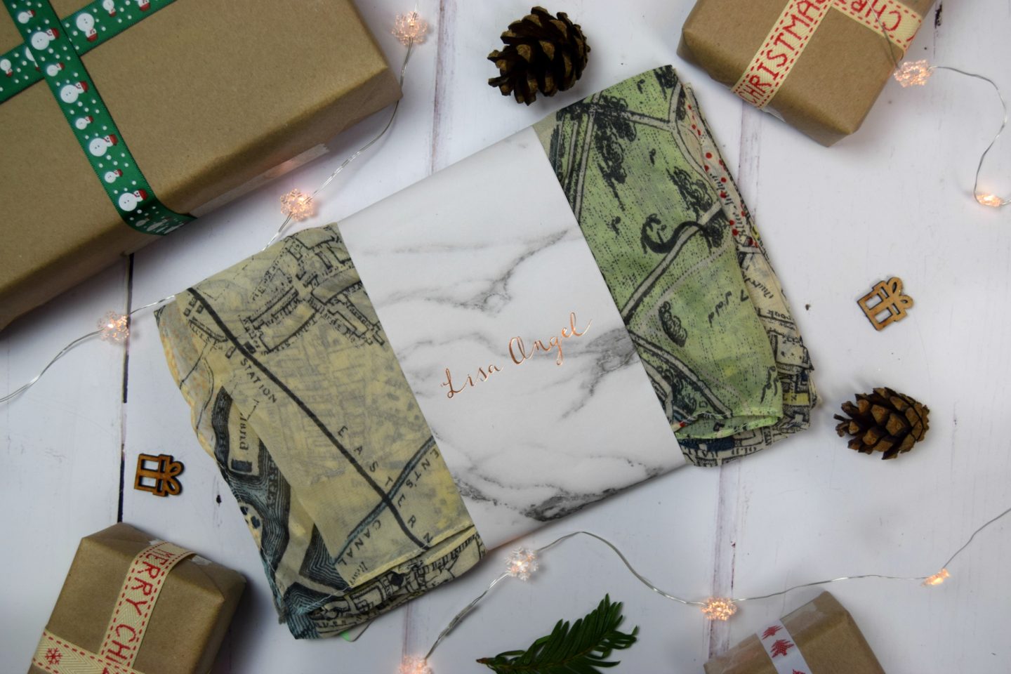 A ladies scarf with the map of London on.