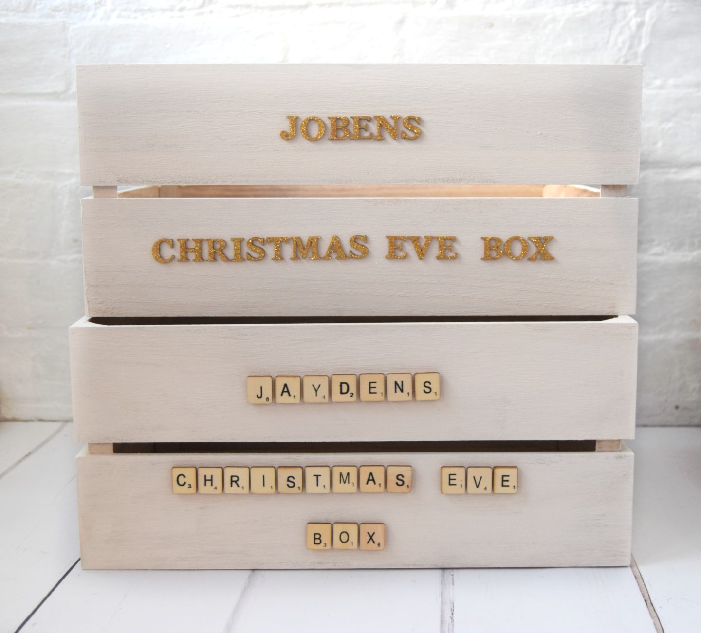 Wooden lettering for Christmas Eve boxes.