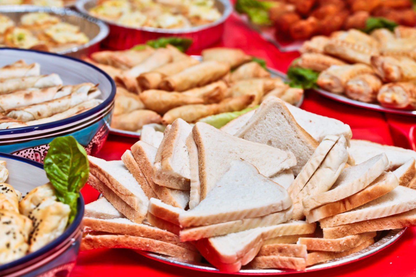 Party food and picky snacks on a table.