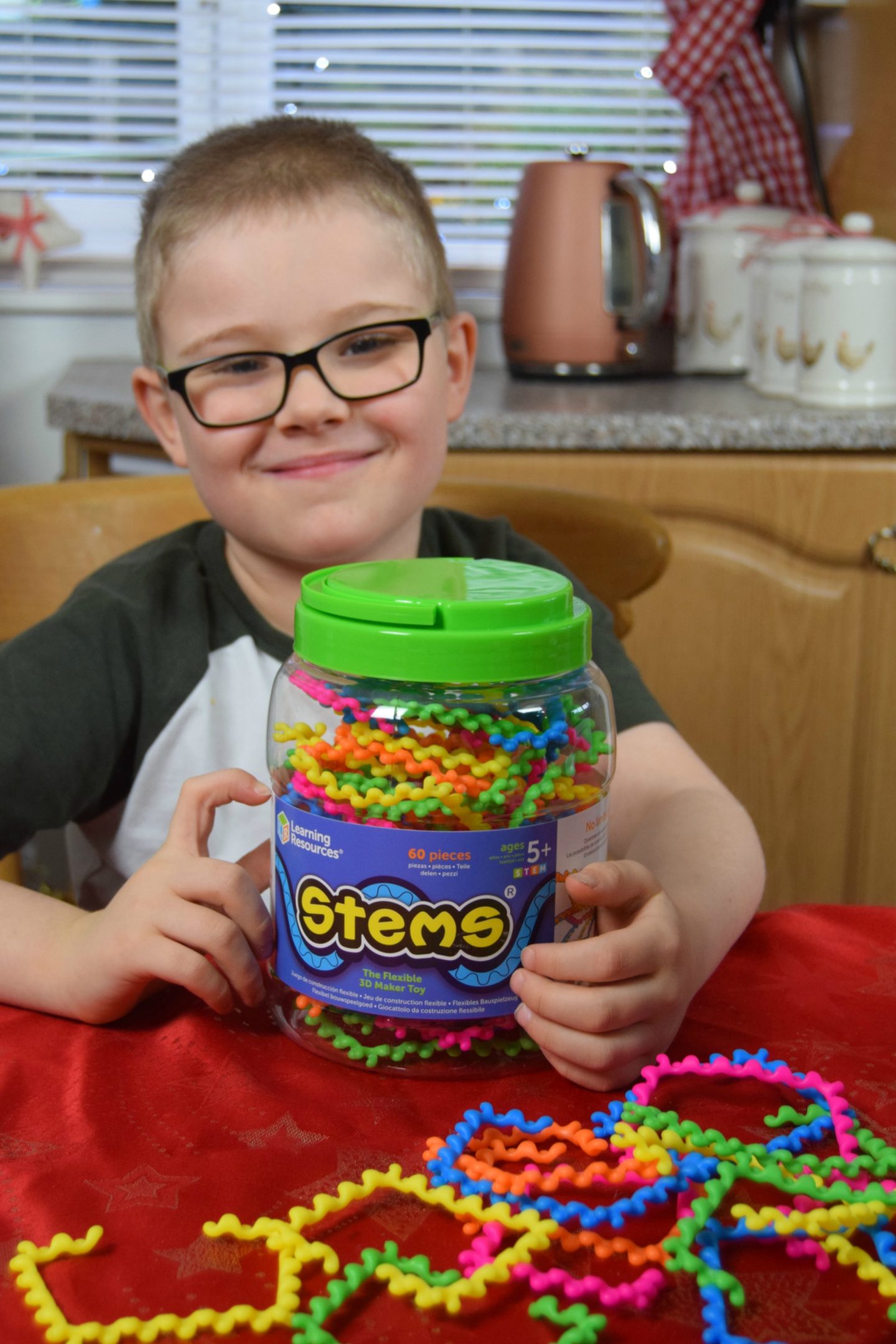 My son ready to create something fun using Stems.