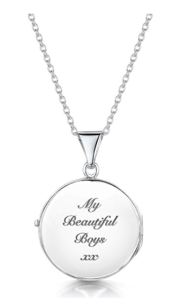 A locket personalised on the back with script font.