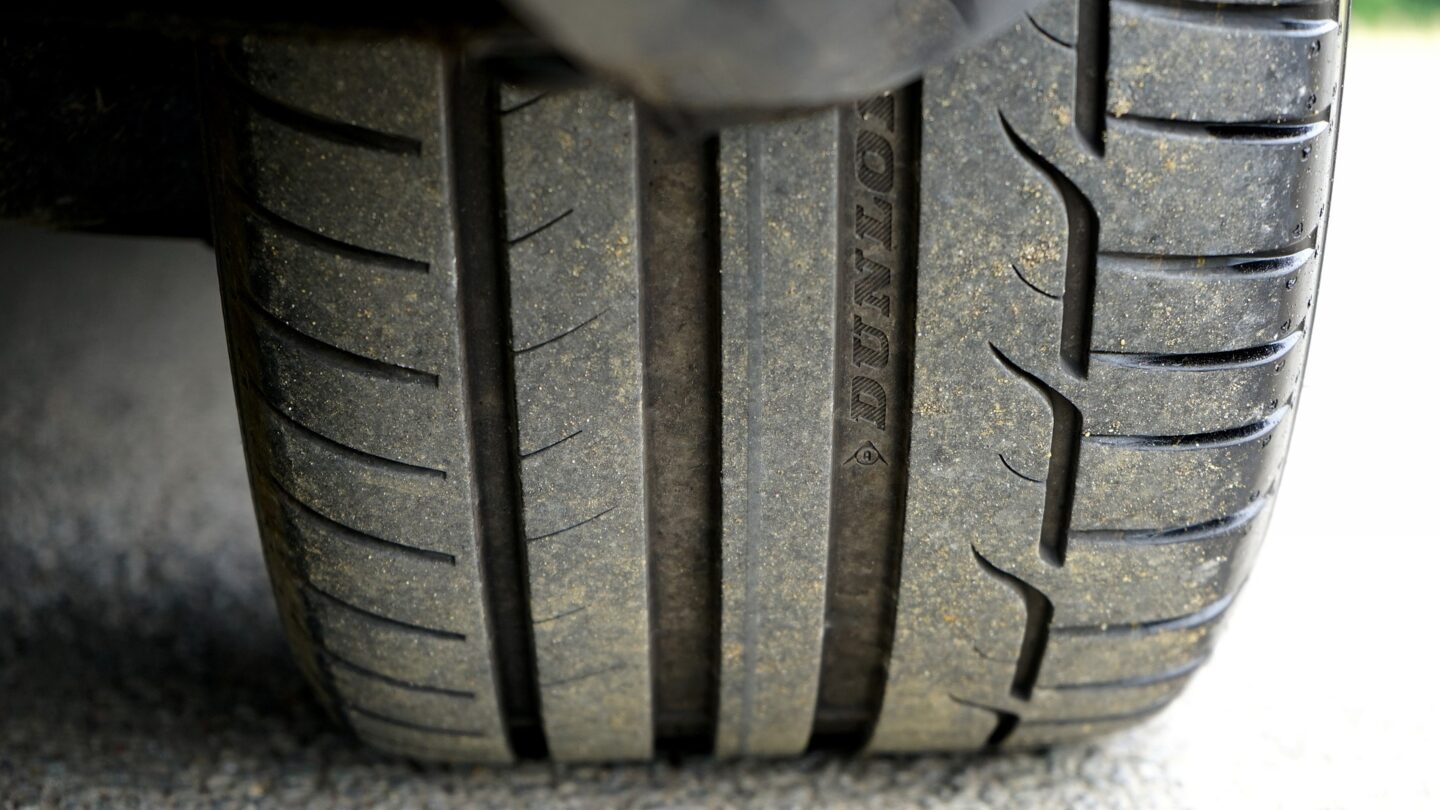 Staying safe on the road. A close up of the treads on a car tyre.
