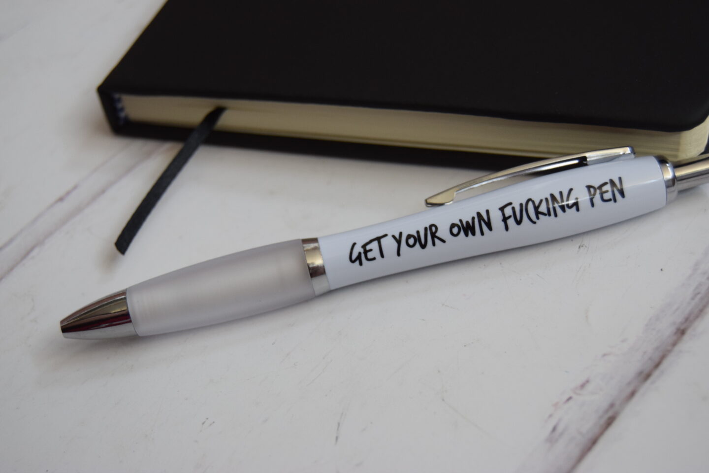 An adult novelty pen. Get your own fucking pen from Love Layla. Gifts for men that have everything.