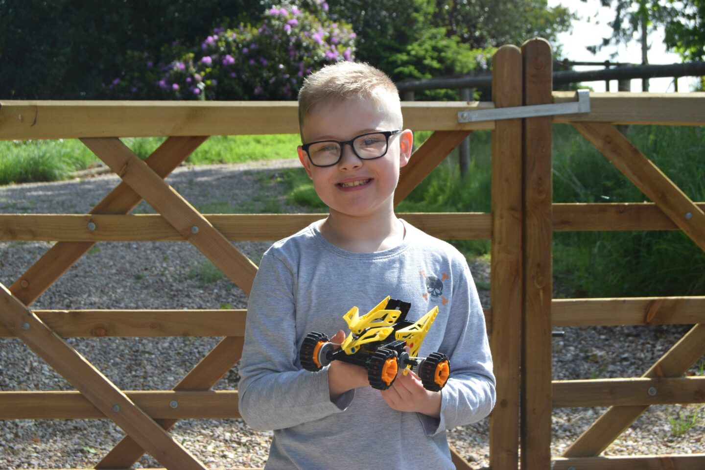 Jayden holding his ATV Racer