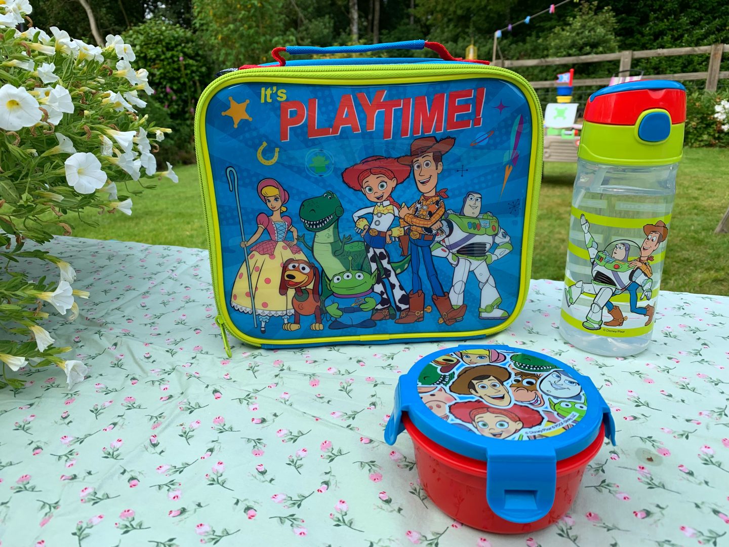 Disney Toy Story Dinner Set. A Disney Toy story lunch bag, a Disney Toy Story water bottle and a Disney Toy Story snack pot.