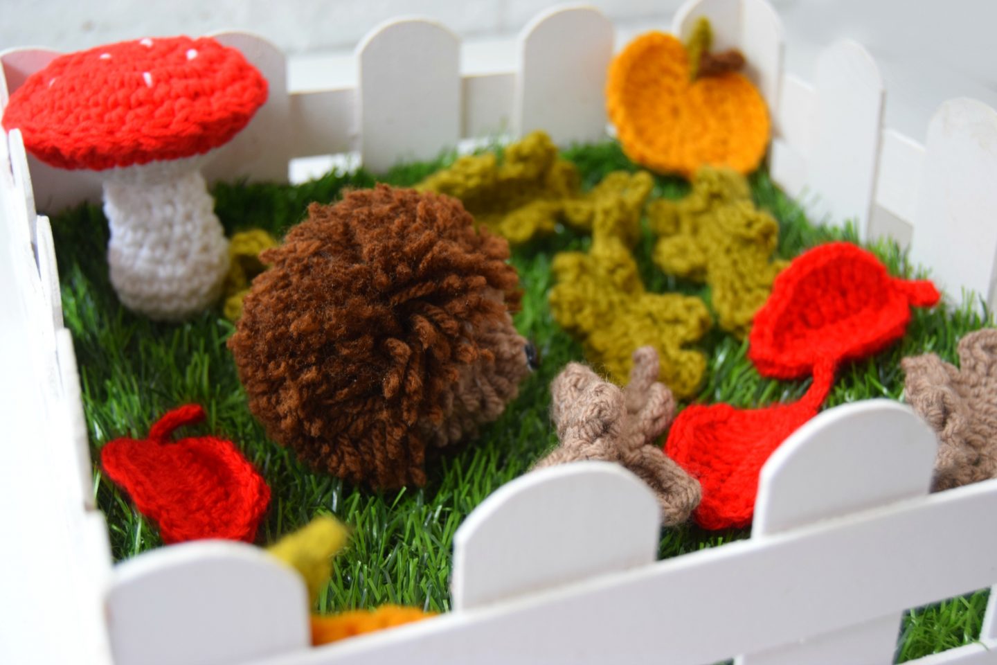 Autumn table decoration with crochet leaves