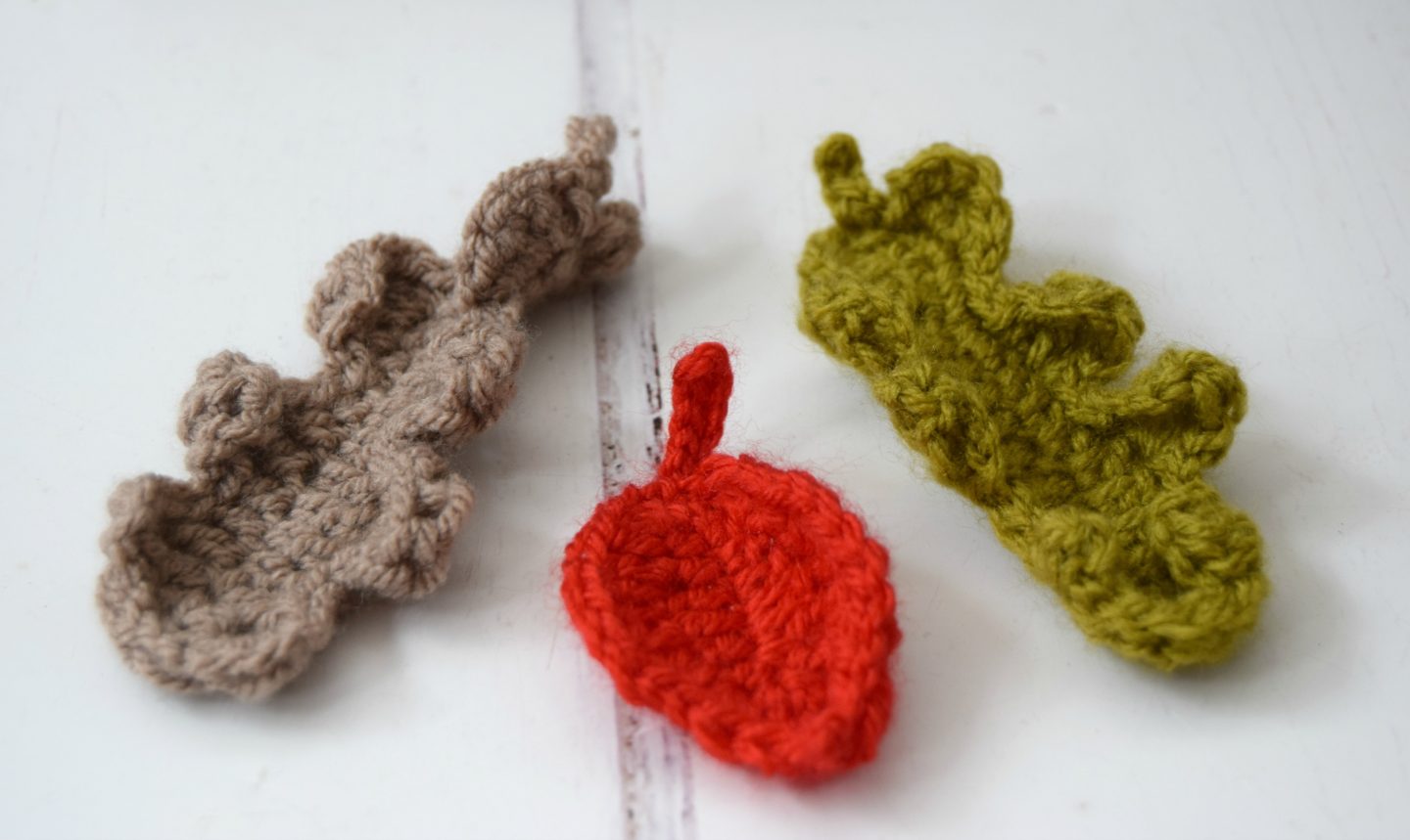 Crochet oak leaves in autumnal colours.