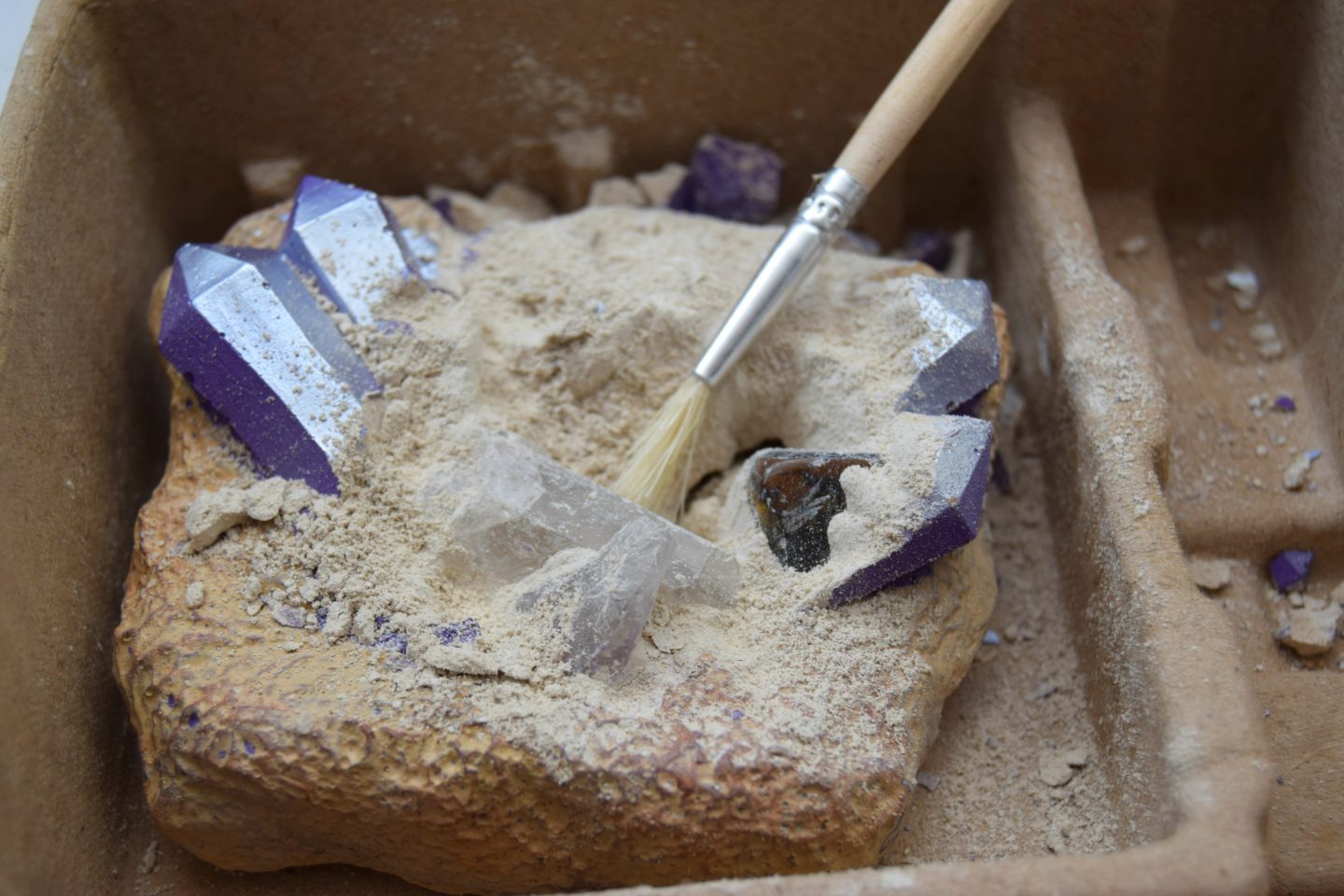 Excavating gemstones with the National geographic gemstone dig kit