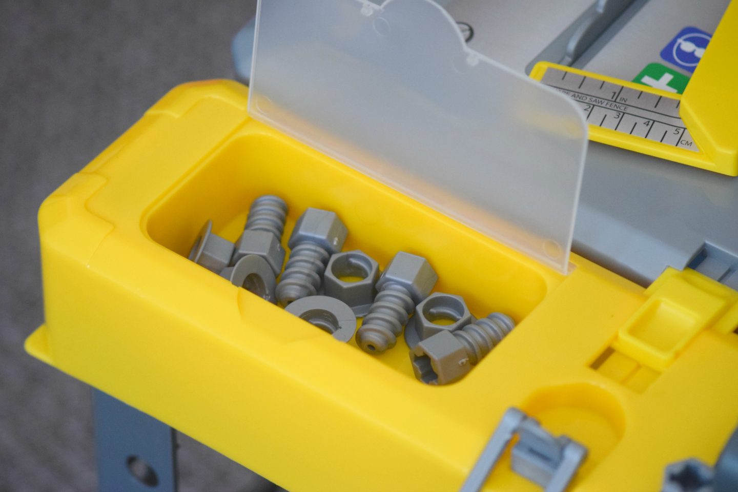 Container to store toy workbench bolts
