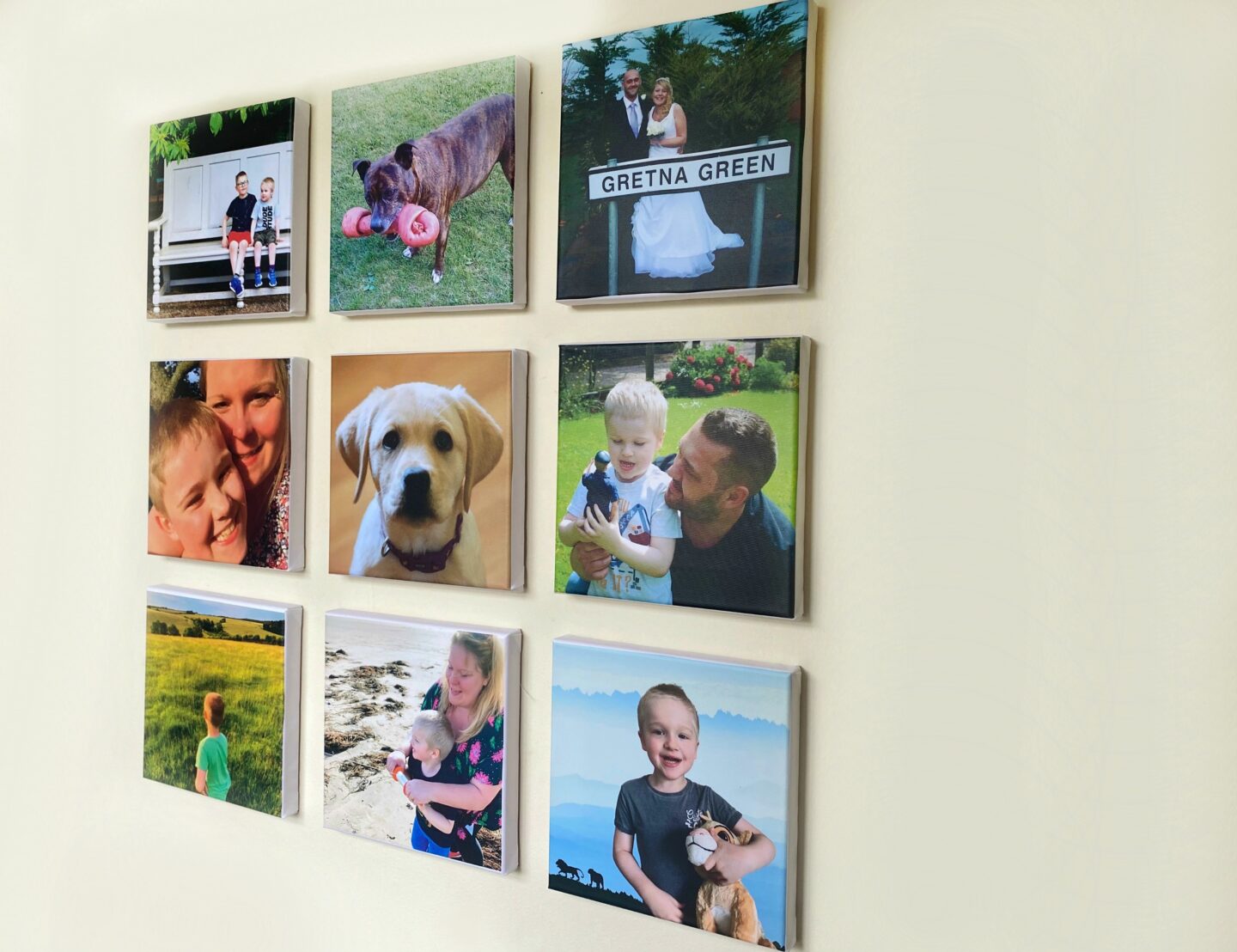 My gallery wall, consisting of 9 square tile canvases.