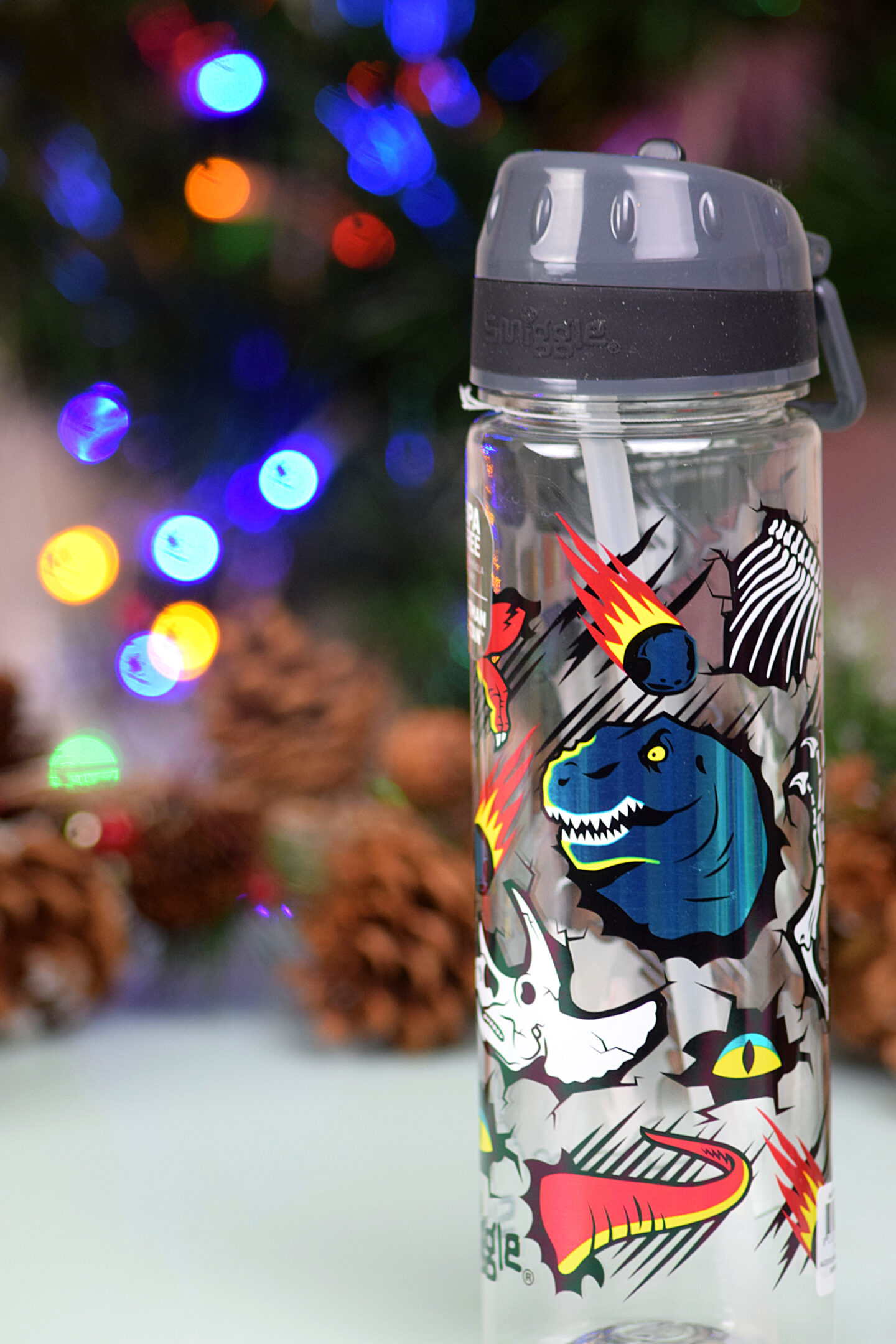 Smiggle children's water bottle with a dinosaur print design