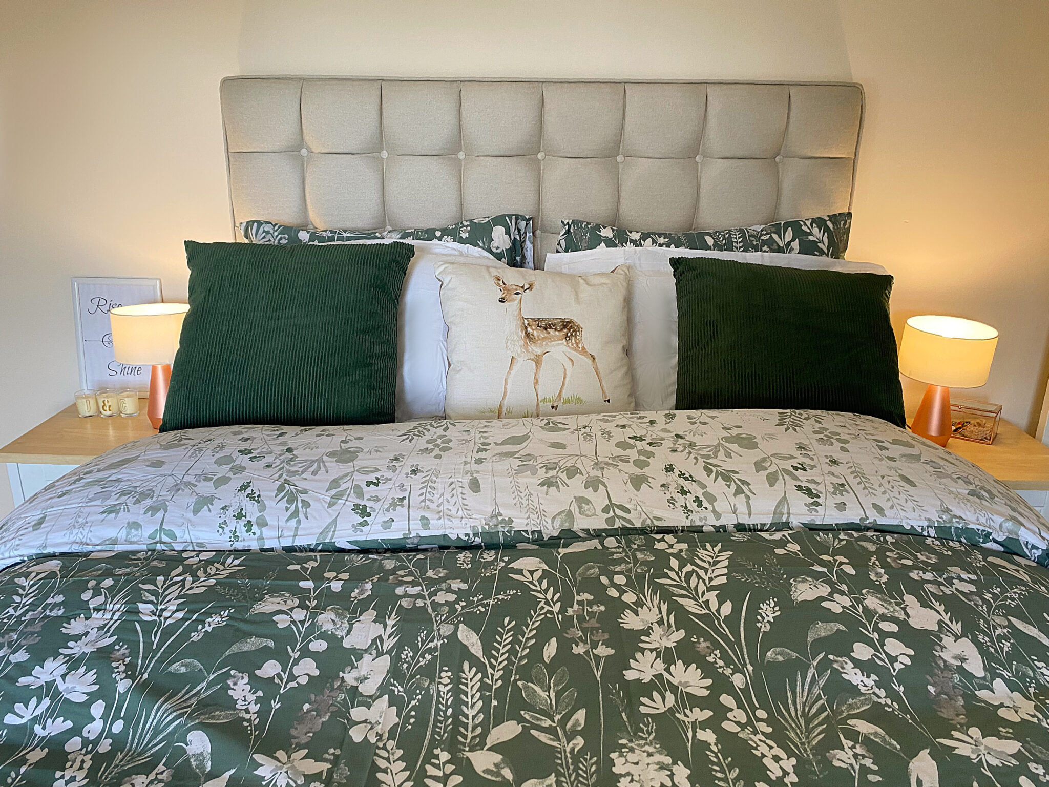 An upholstered headboard on a double divan bed