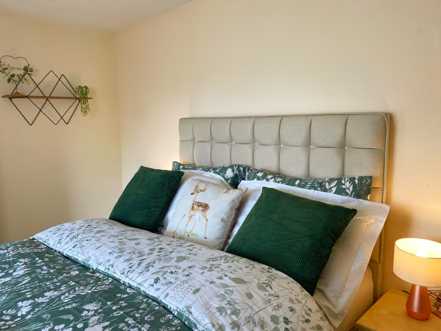 Double divan bed with forest themed bedding