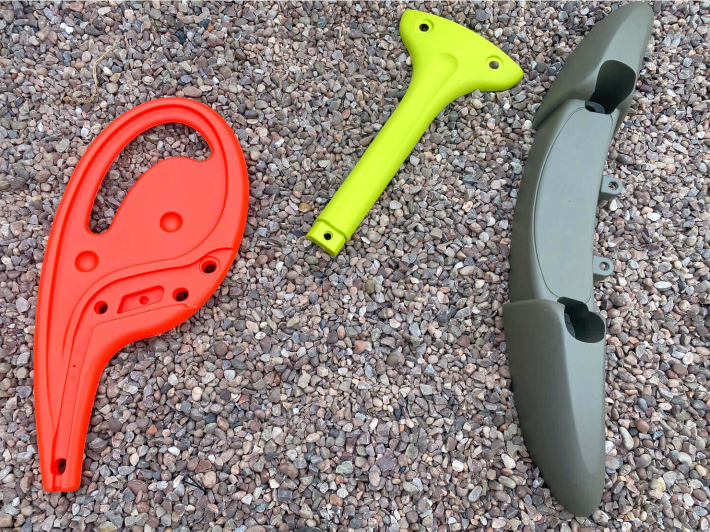 Smoby slide parts on a gravel floor