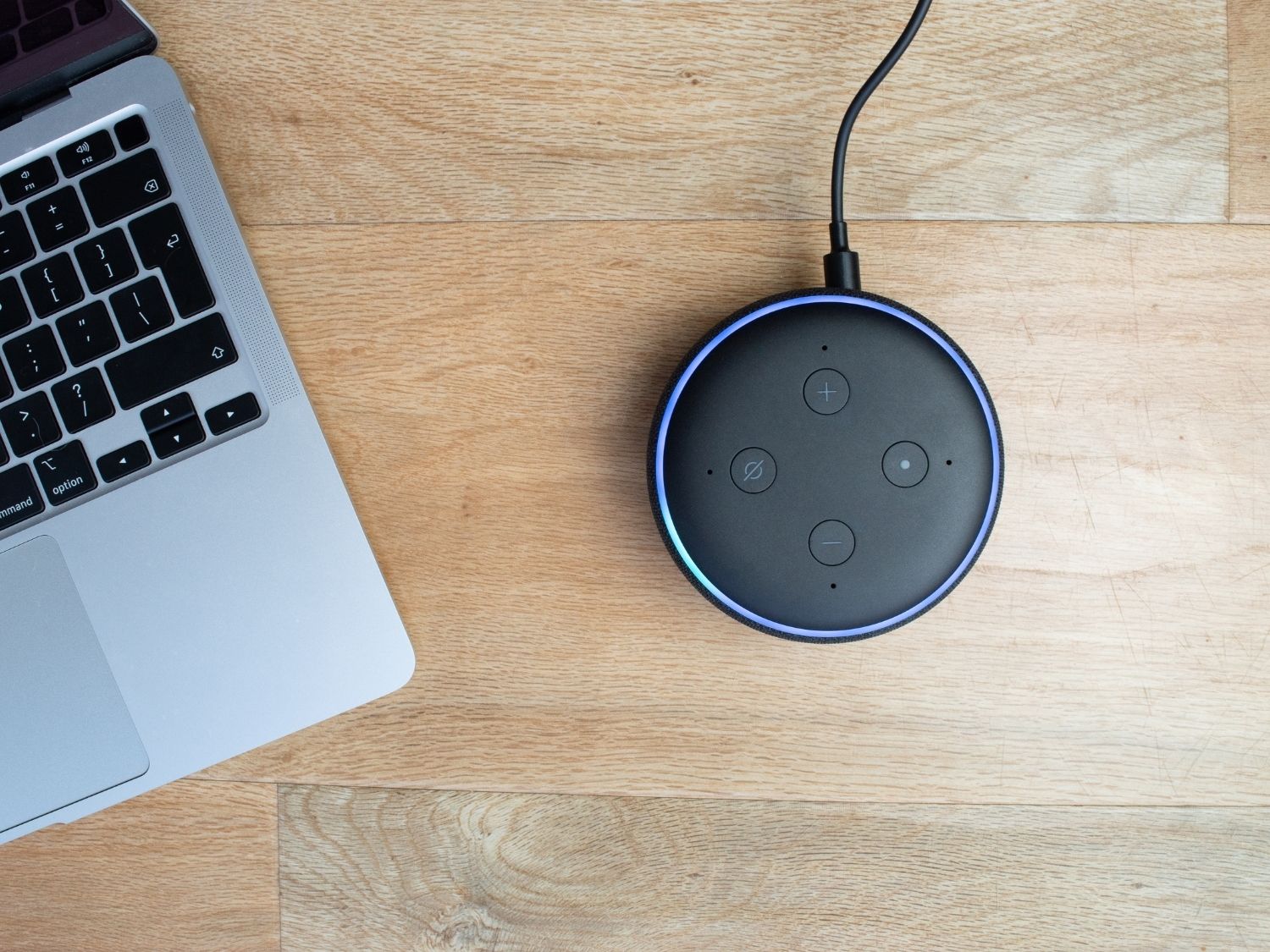 An Alexa smart gadget on a desk.