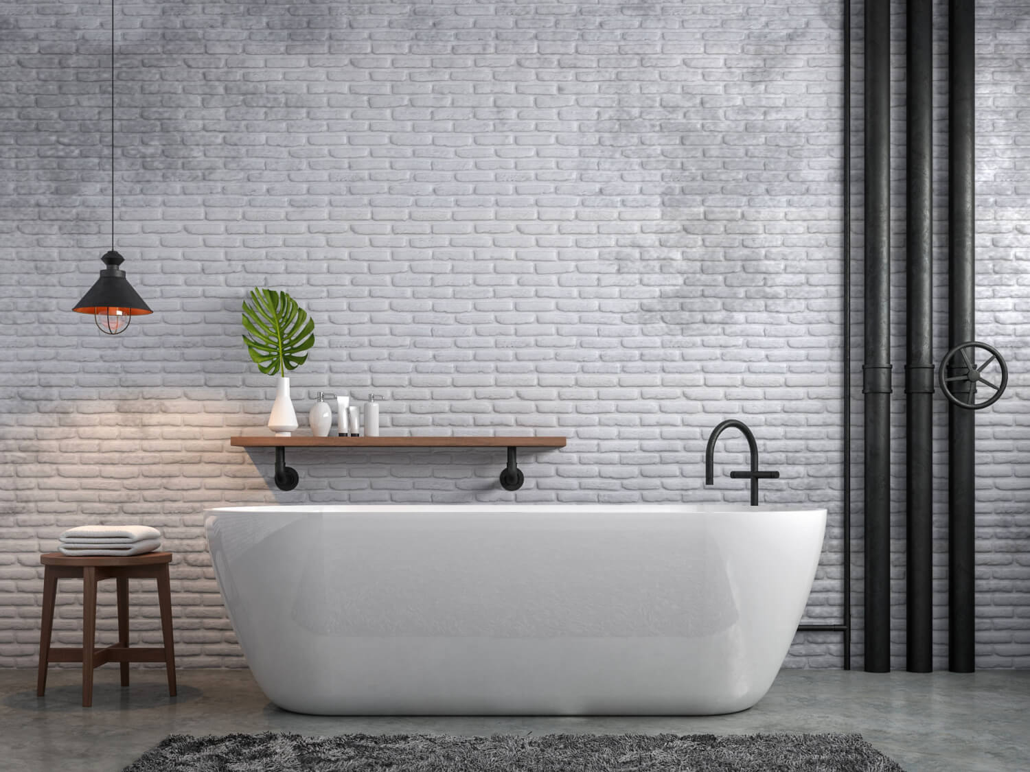 A modern bathroom with white metro tiles and a freestanding bath tub.