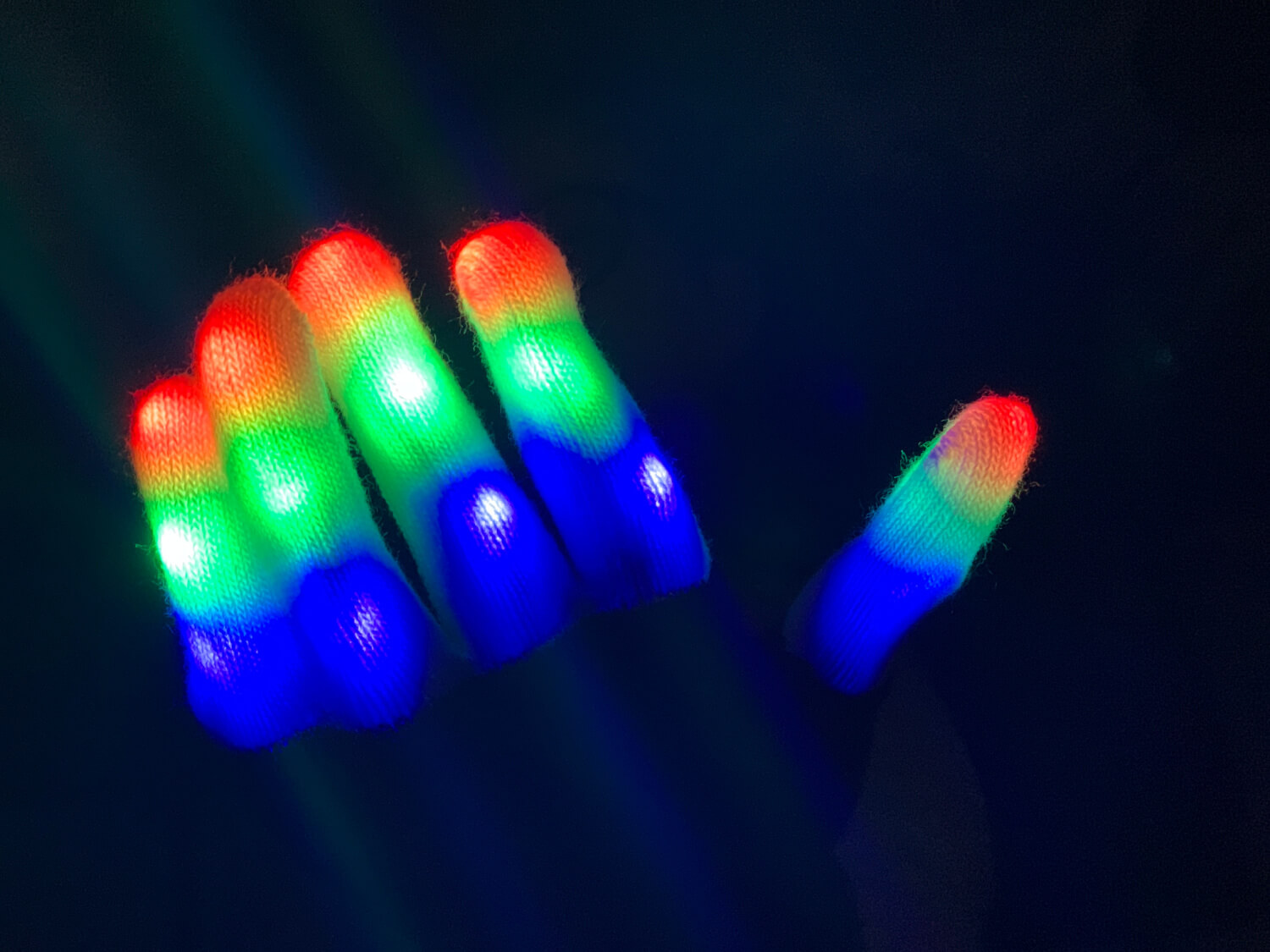 White gloves that light up with multicoloured LED's in the fingers.