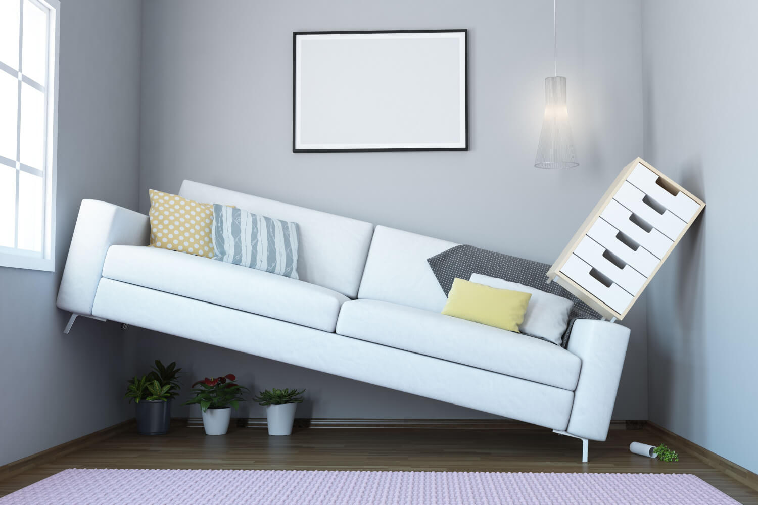 A sofa that is squashed up the corner of a room with a cupboard on top.