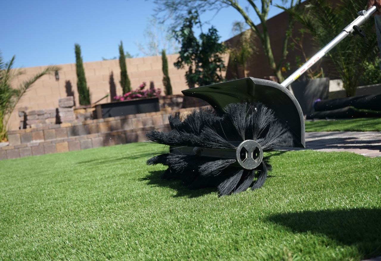 Brushing artificial grass