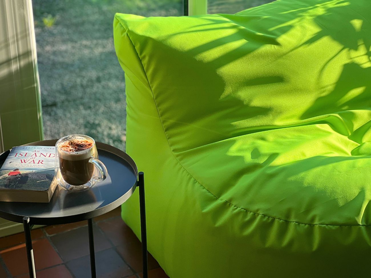 Green bean bag in conservatory 1