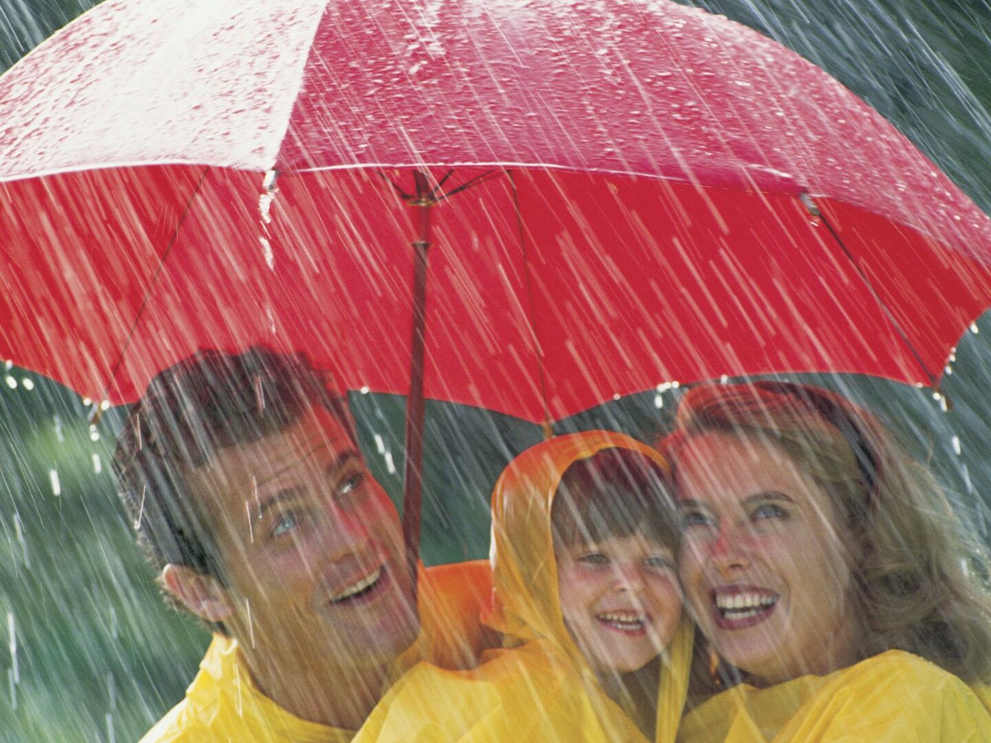 Family under umbrella